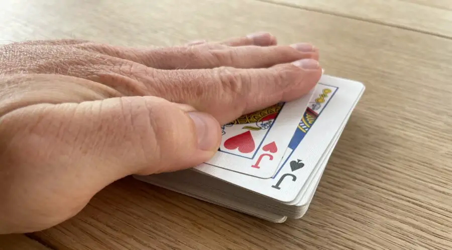 Slapping a Jack in a game of Slapjack