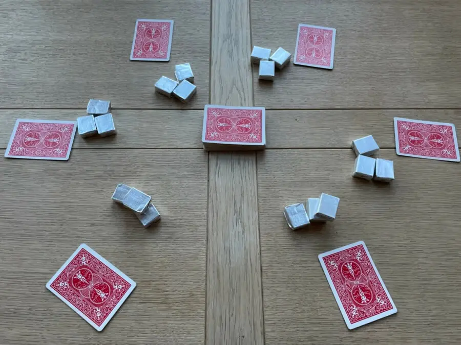 A single card dealt to each of the 5 players in a game of Chase the Ace